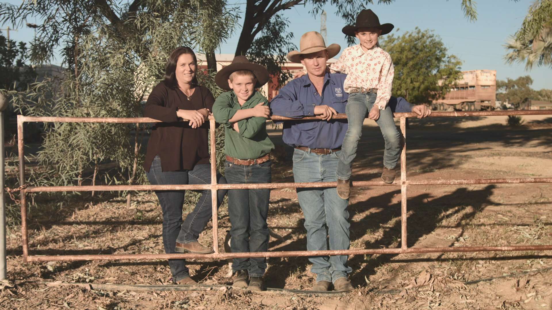 Family on Fence